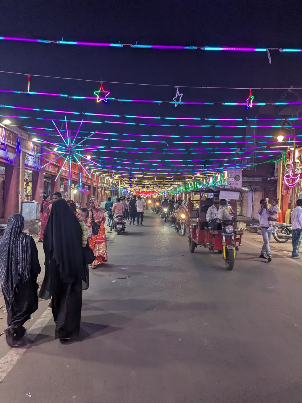 Jaipur night market lit with festival lights